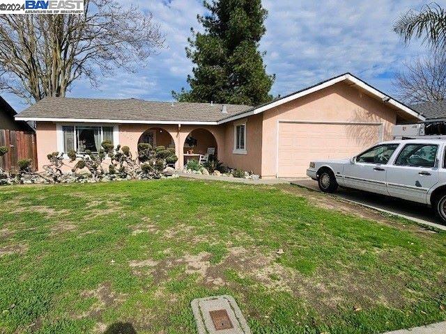 1413 Clevenger Drive Modesto, CA 95356 - Photo 1 of 1 a view of house with garden
