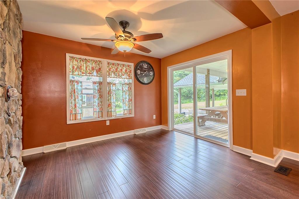 2116 Spaulding Road Clymer, PA 15728 - Photo 8 of 50 Breakfast Nook area just off the kitchen with sliding glass doors to porch area, carport and yard area.