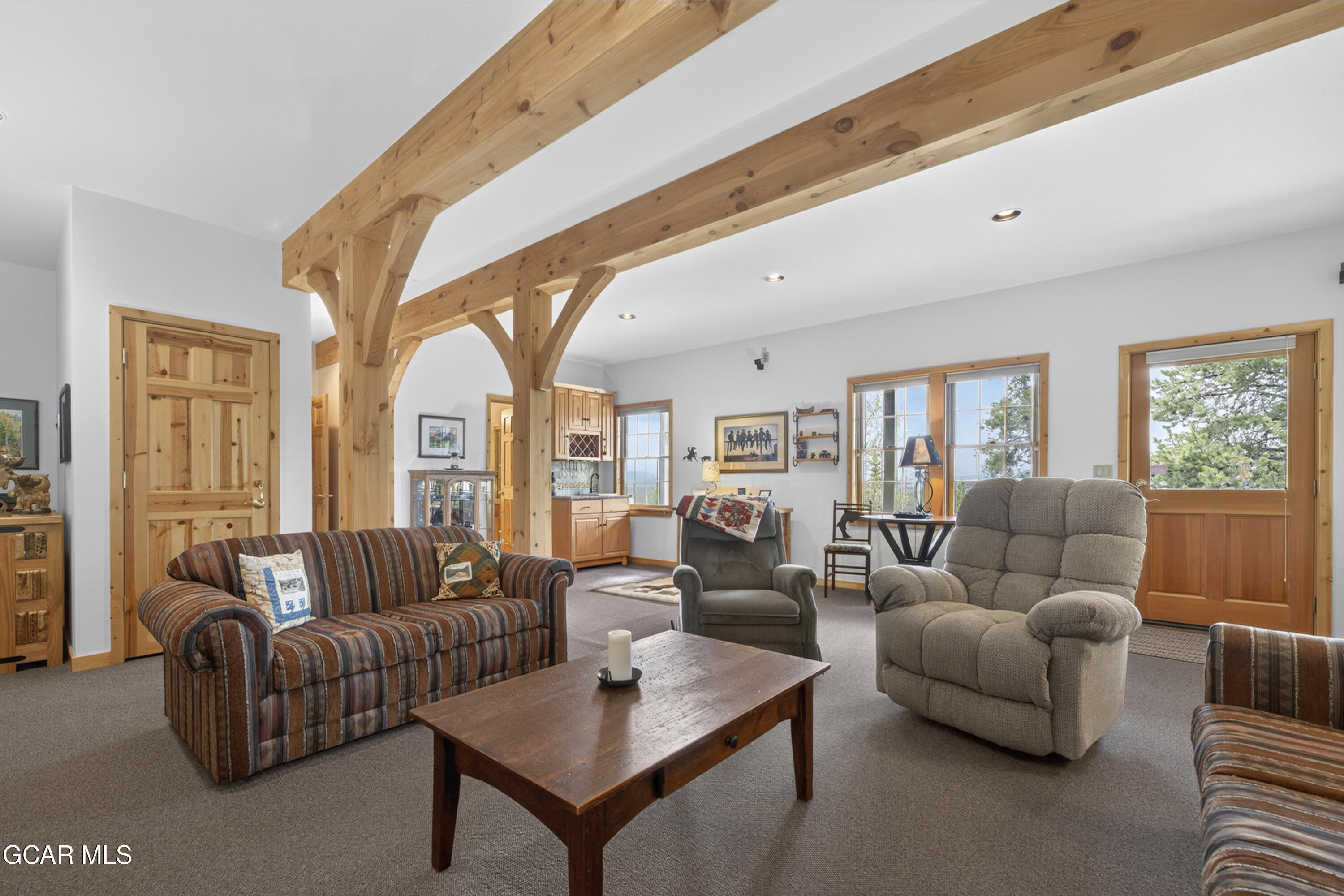 400 Ridge Road Tabernash, CO 80478 - Photo 28 of 50 a living room with furniture and a large window