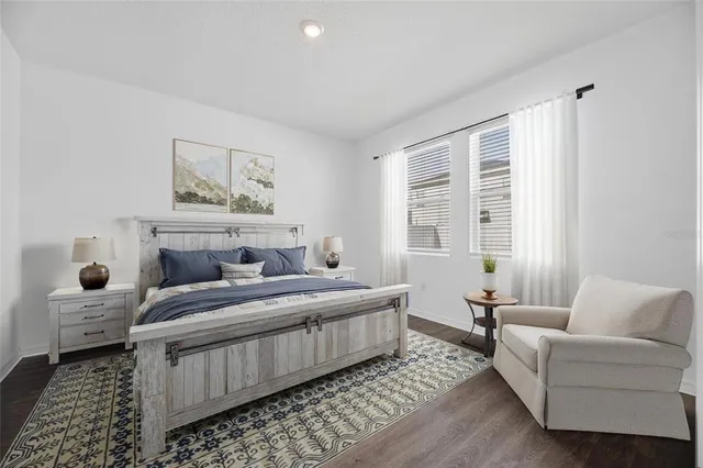 a bathroom with a shower and a glass door