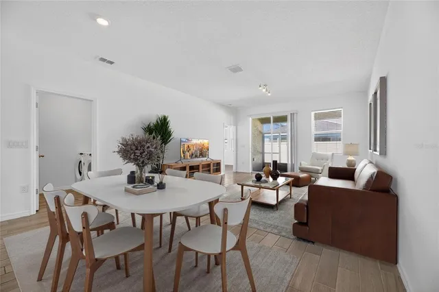a kitchen with kitchen island a sink stainless steel appliances and counter space