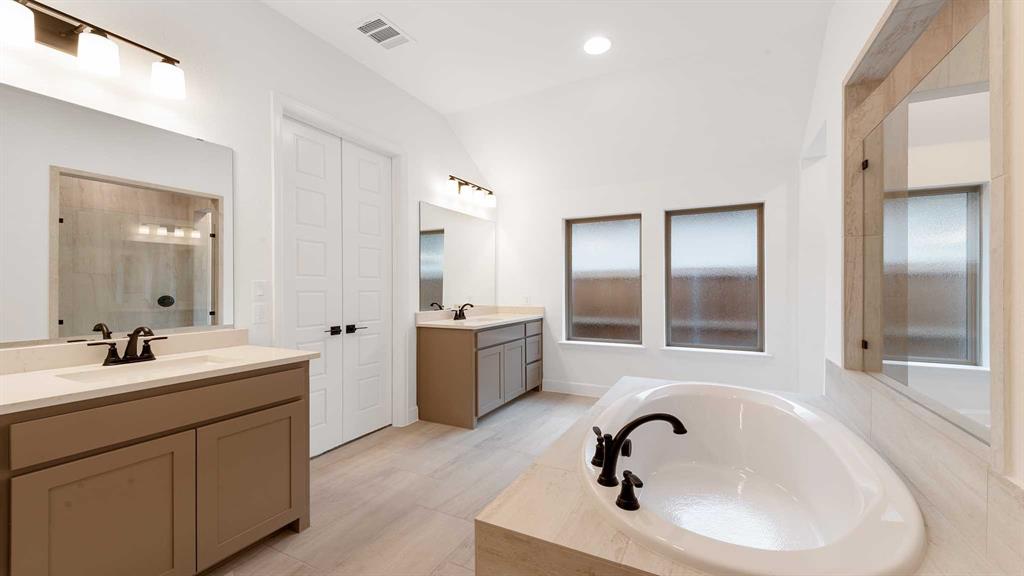 829 Stoney Bridge Way Lavon, TX 75166 - Photo 15 of 35 a bathroom with a sink and mirror