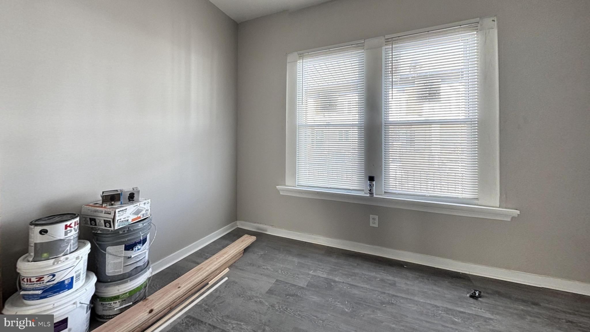 2644 South Felton Street Philadelphia, PA 19142 - Photo 2 of 9 a room with a wooden floor and shoes