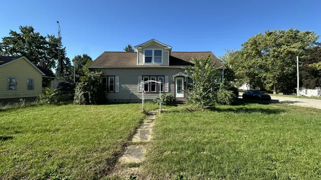 a house view with a garden space