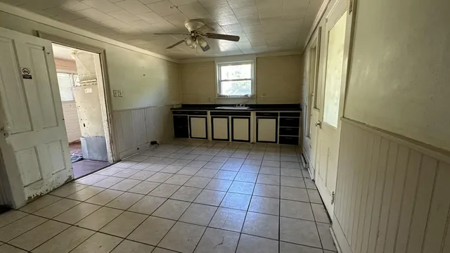 a view of an empty room and window