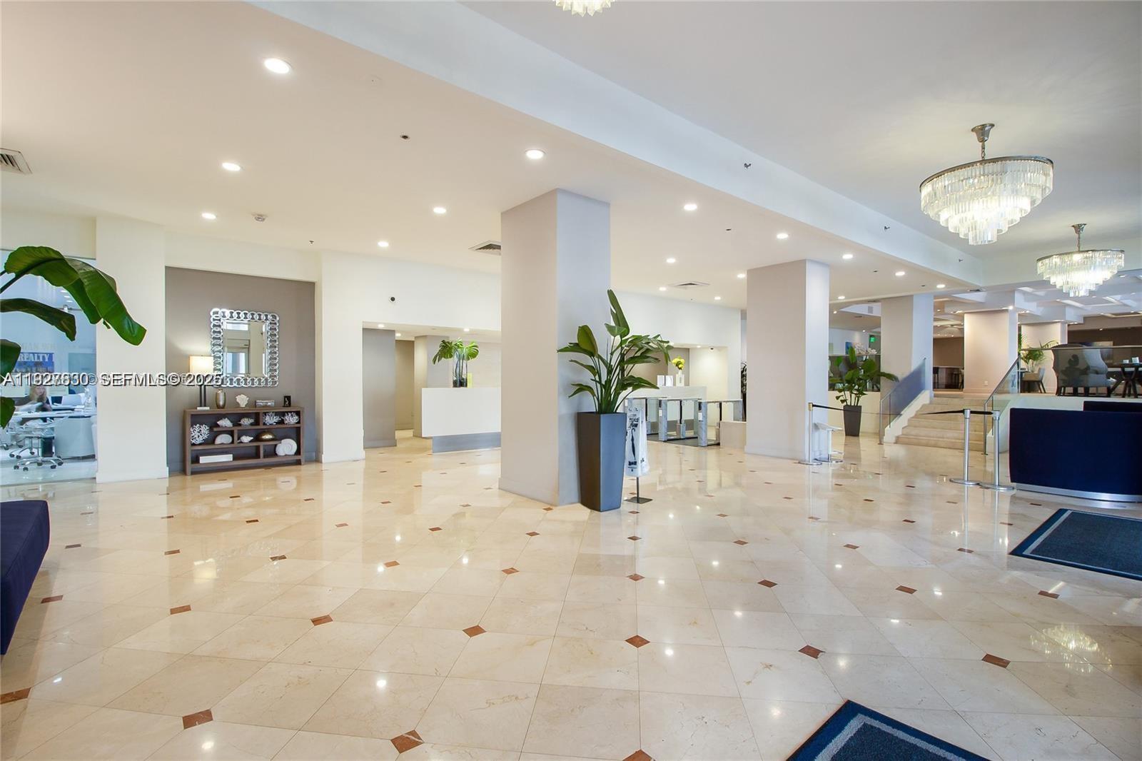100 Lincoln Road, Unit 1227 Miami Beach, FL 33139 - Photo 11 of 11 a view of a kitchen and dining area