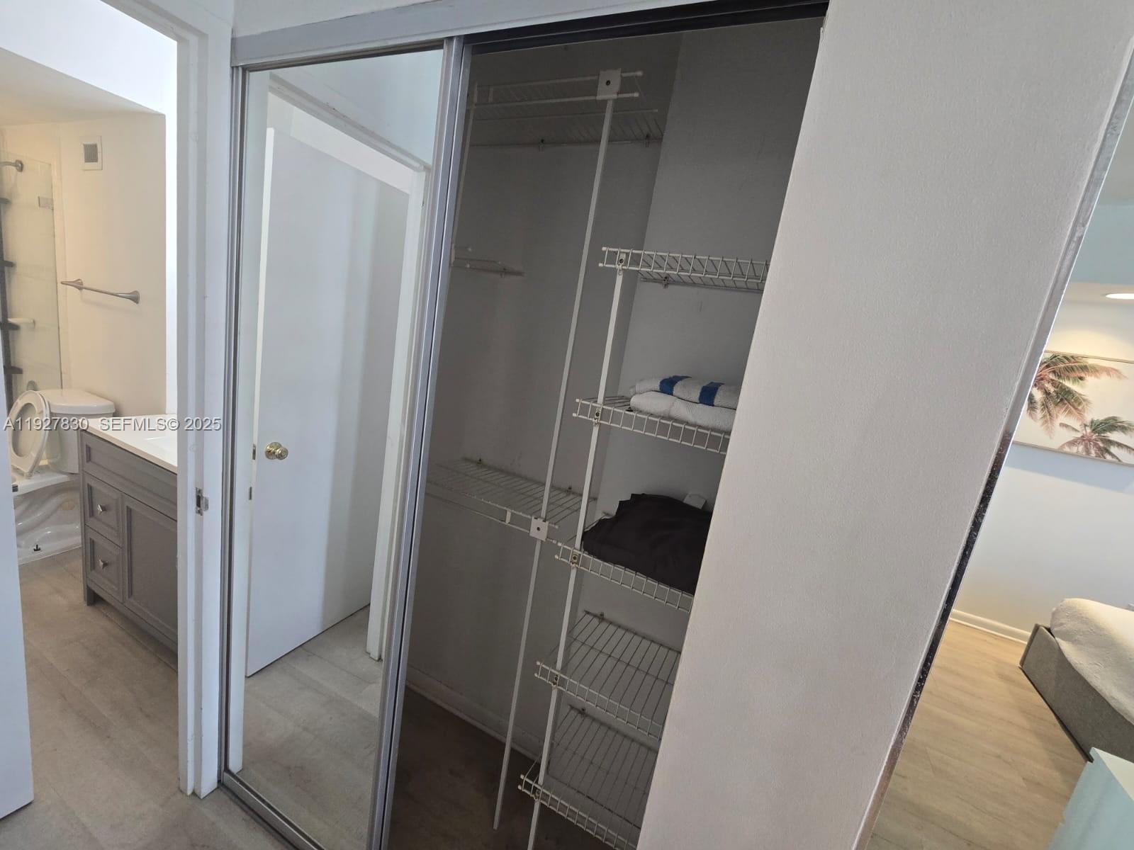 100 Lincoln Road, Unit 1227 Miami Beach, FL 33139 - Photo 8 of 11 a view of walk in closet