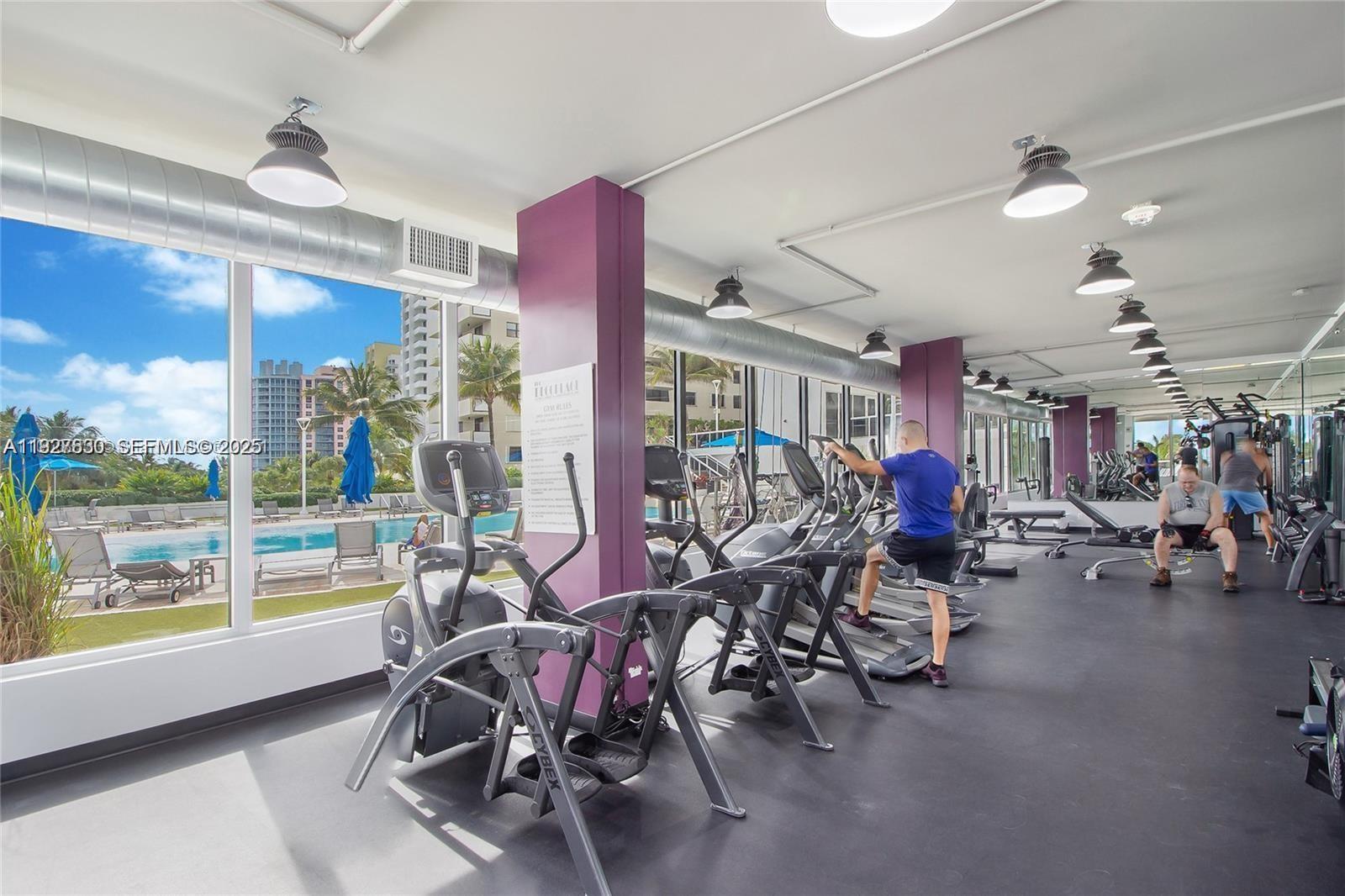 100 Lincoln Road, Unit 1227 Miami Beach, FL 33139 - Photo 9 of 11 a view of a room with gym equipment