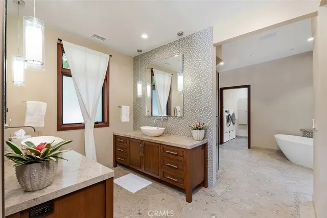 a stove top oven sitting next to a window