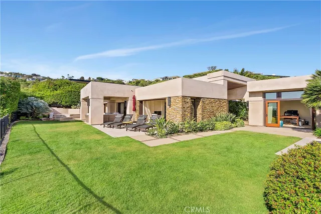 a view of a yard in front of a house