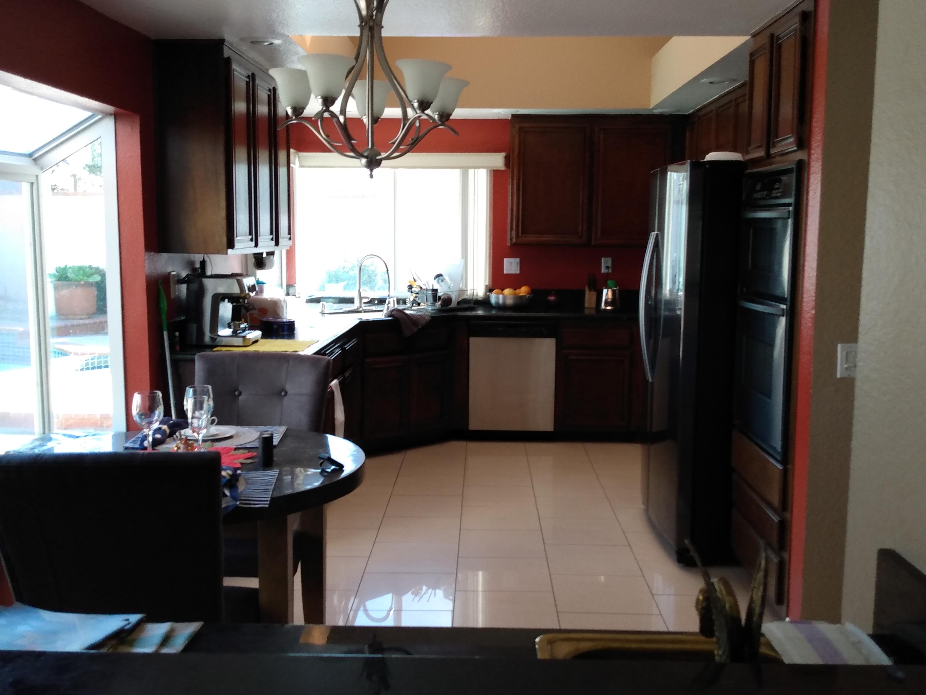 17 La Torre Drive Phillips Ranch, CA 91766 - Photo 3 of 5 a kitchen with a refrigerator and a table