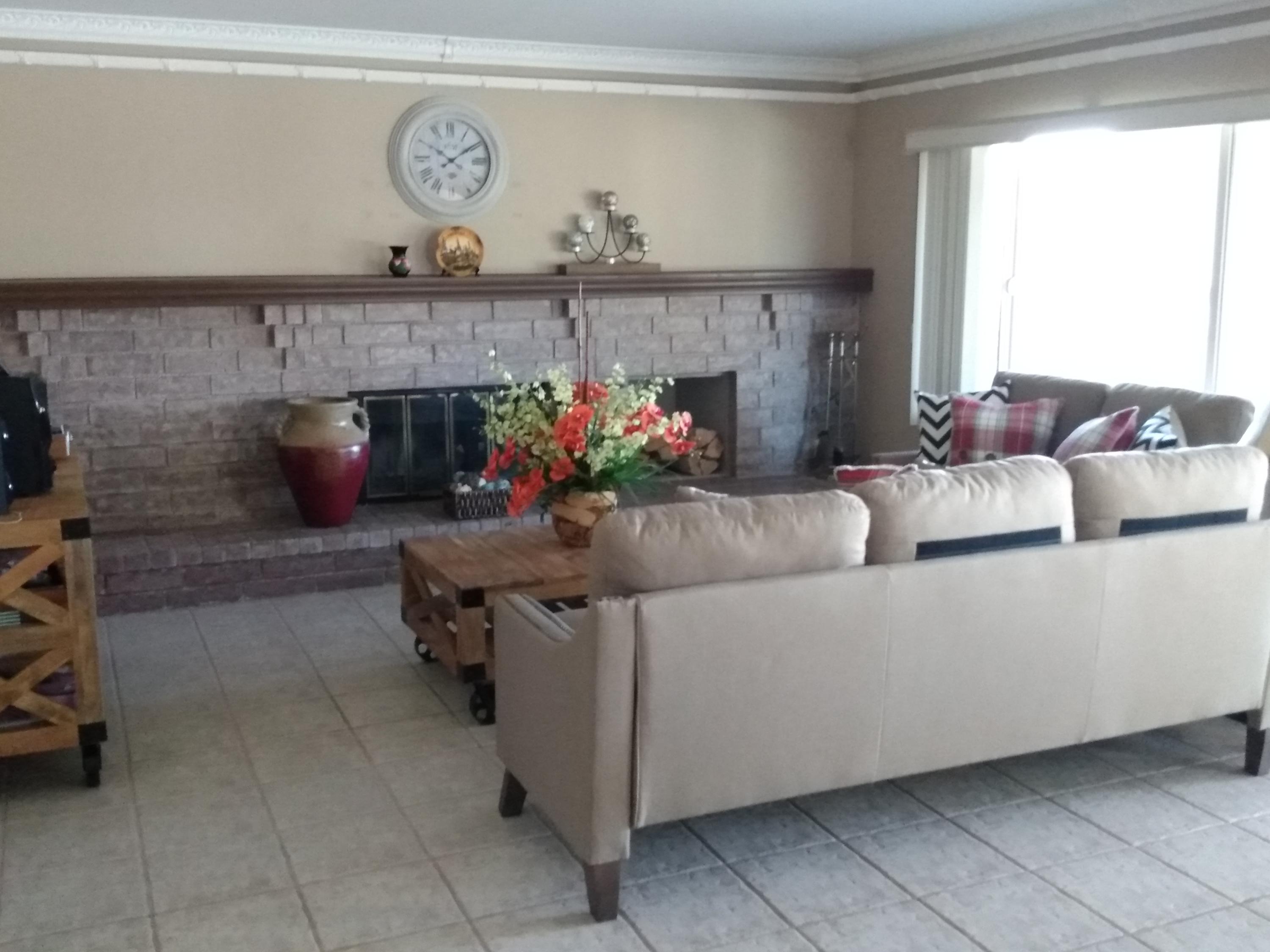 17 La Torre Drive Phillips Ranch, CA 91766 - Photo 5 of 5 a living room with furniture and flowers