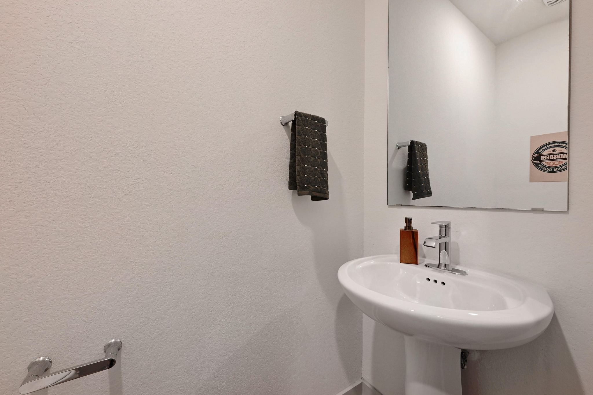 522 Wilshire Road San Marcos, TX 78666 - Photo 14 of 22 a bathroom with a sink and mirror