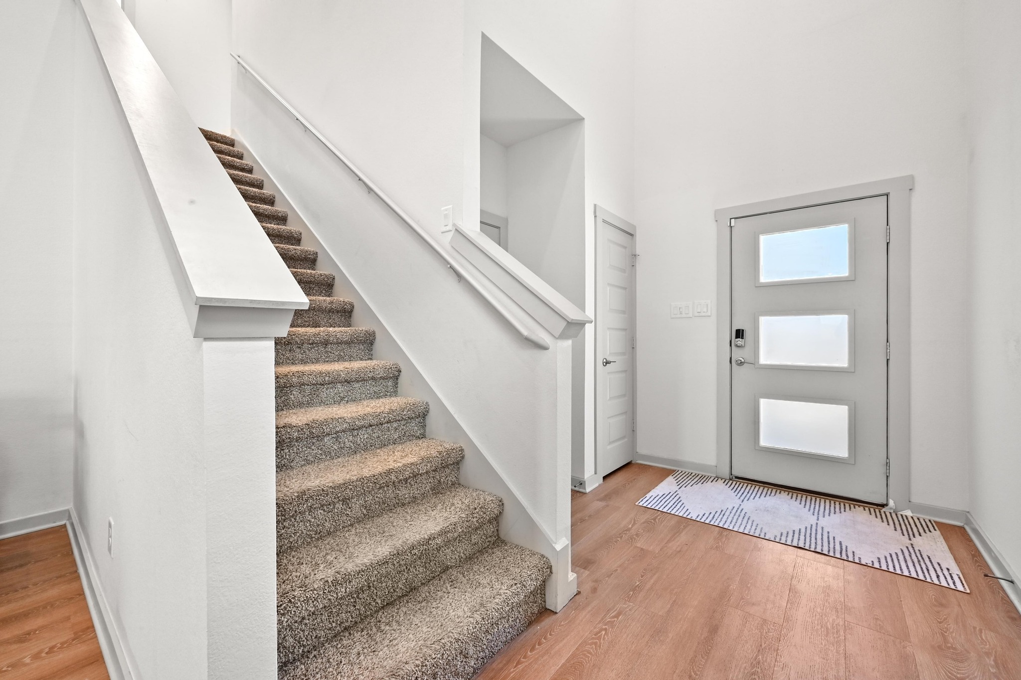 522 Wilshire Road San Marcos, TX 78666 - Photo 3 of 22 a view of entryway and hall with wooden floor
