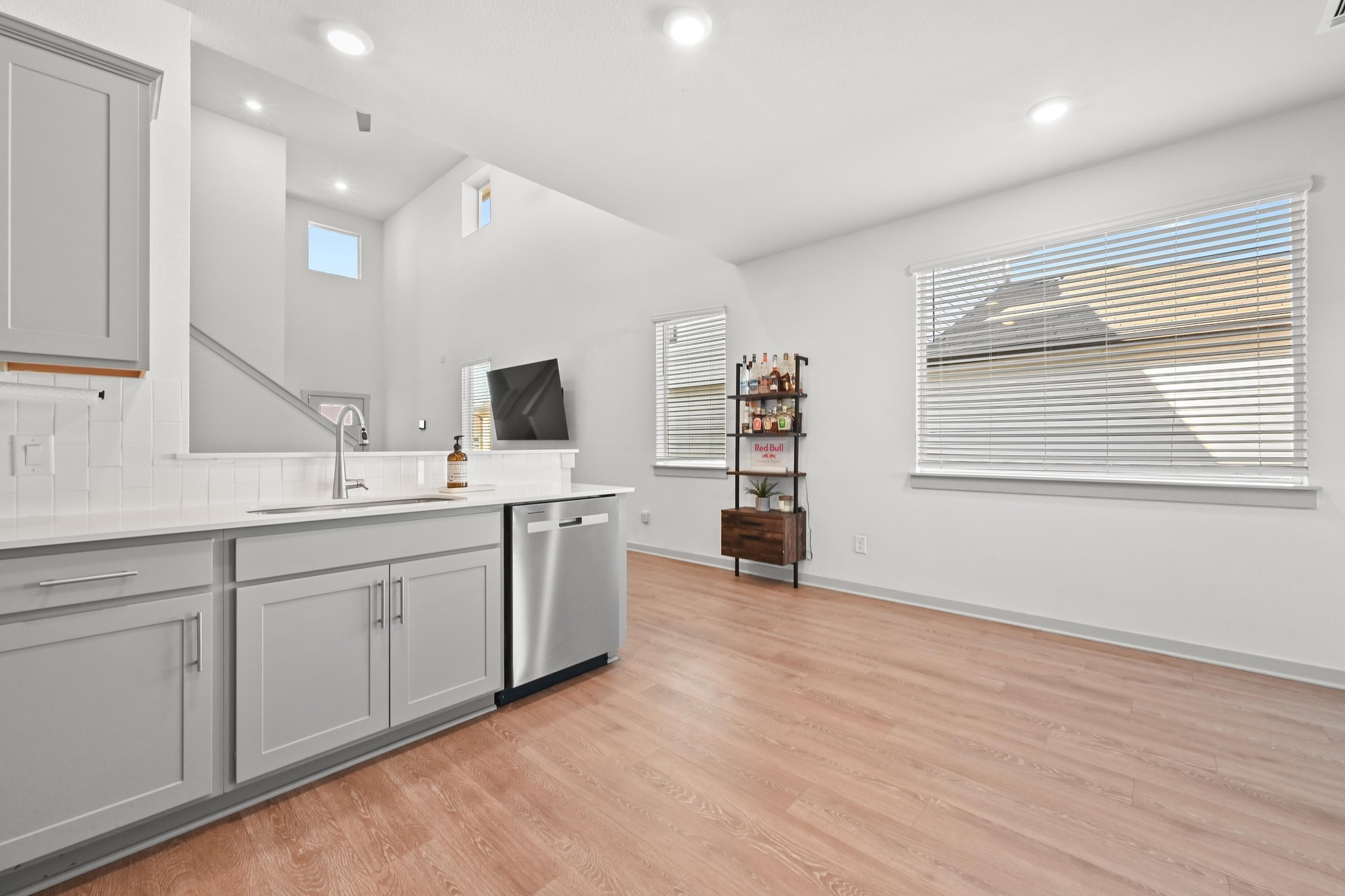 522 Wilshire Road San Marcos, TX 78666 - Photo 9 of 22 a spacious bathroom with stainless steel appliances a sink and a large mirror