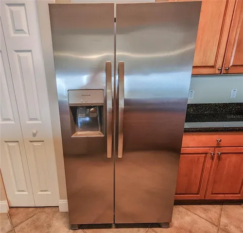 a view of a utility room with washer and dryer
