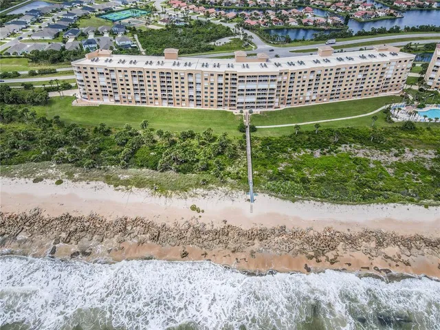 a view of a balcony with an ocean view