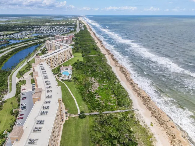 a view of a balcony with wooden floor