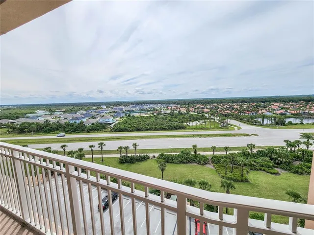 a view of city with ocean