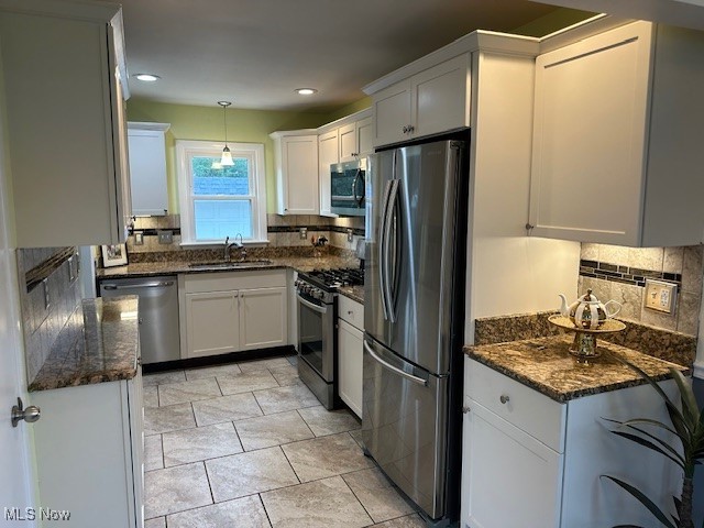 30101 Oakdale Road Willowick, OH 44095 - Photo 17 of 17 Kitchen with dishwasher, high quality fridge, stove, decorative backsplash, and recessed lighting