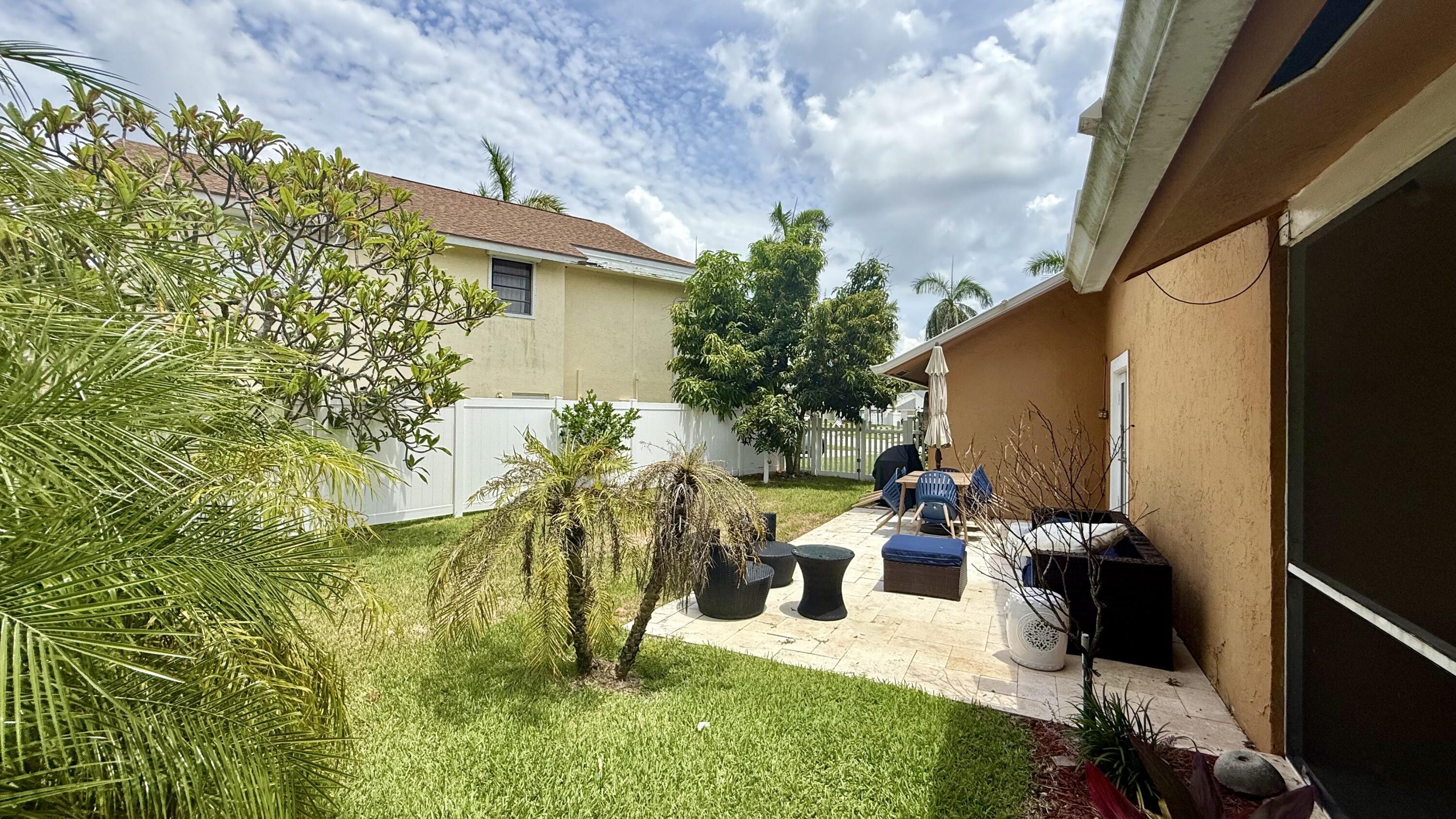 1526 Cormorant Road Delray Beach, FL 33444 - Photo 19 of 23 Side yard