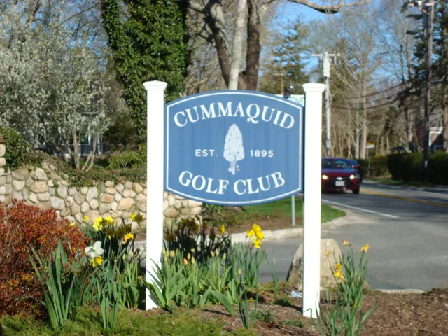 a sign broad on the side of the road