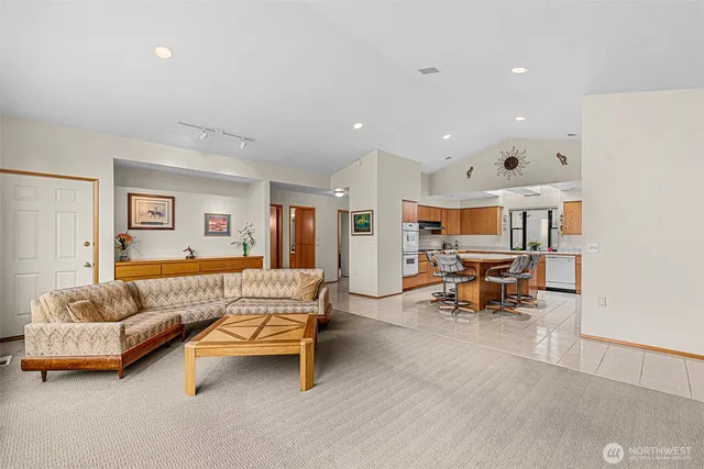 a living room with furniture and a couch