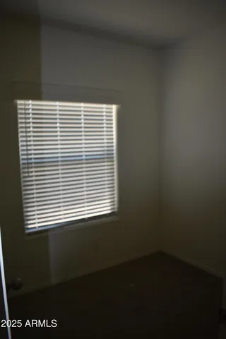 a view of a room that has a window in it