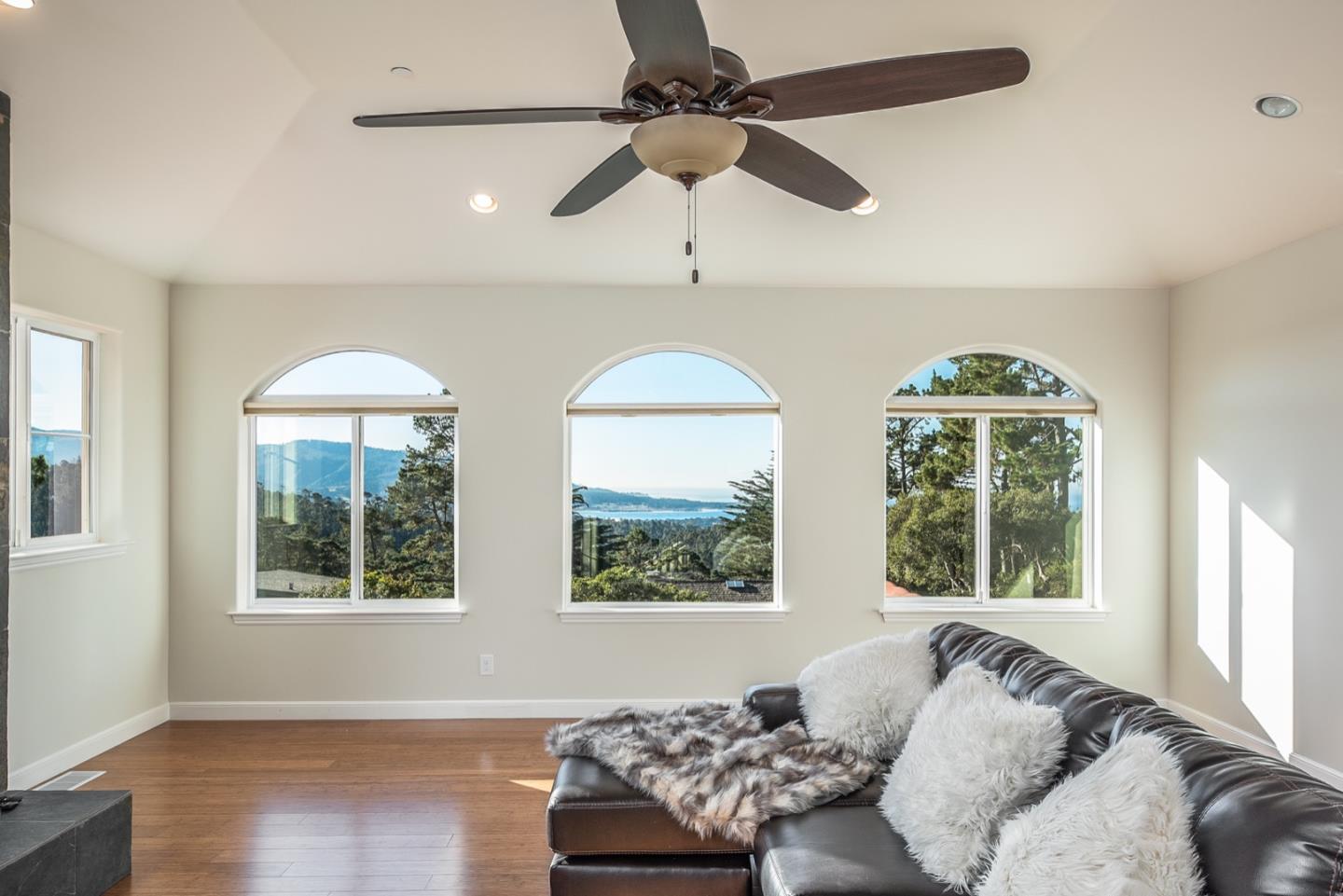 4157 Sunridge Road Pebble Beach, CA 93953 - Photo 12 of 25 a living room with furniture and a large window