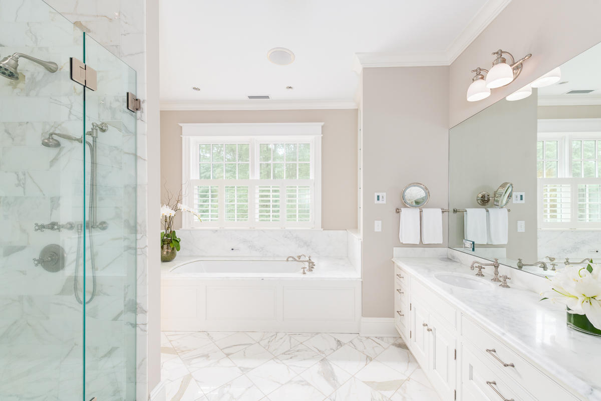 8 Shady Acres Road Darien, CT 06820 - Photo 13 of 18 a spacious bathroom with a tub sink shower and mirror