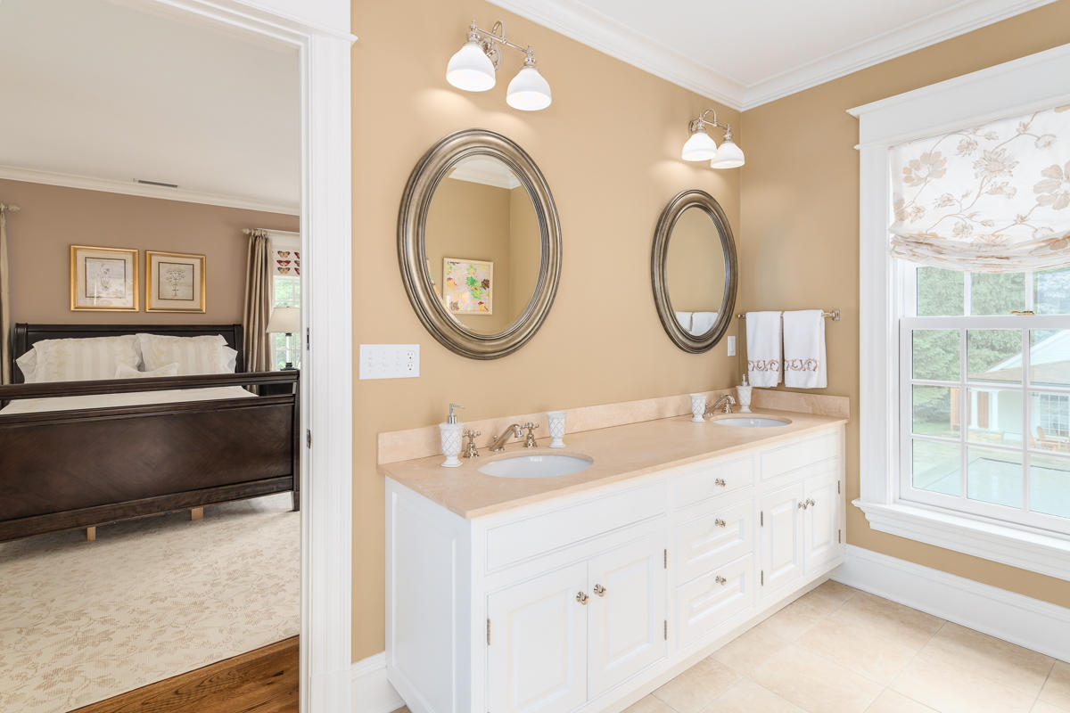 8 Shady Acres Road Darien, CT 06820 - Photo 15 of 18 a bathroom with a double vanity sink and a mirror