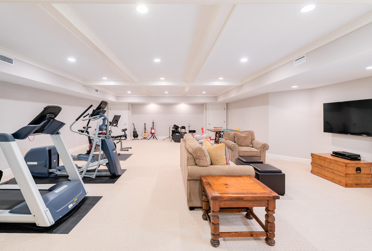 8 Shady Acres Road Darien, CT 06820 - Photo 18 of 18 a living room with furniture and a flat screen tv