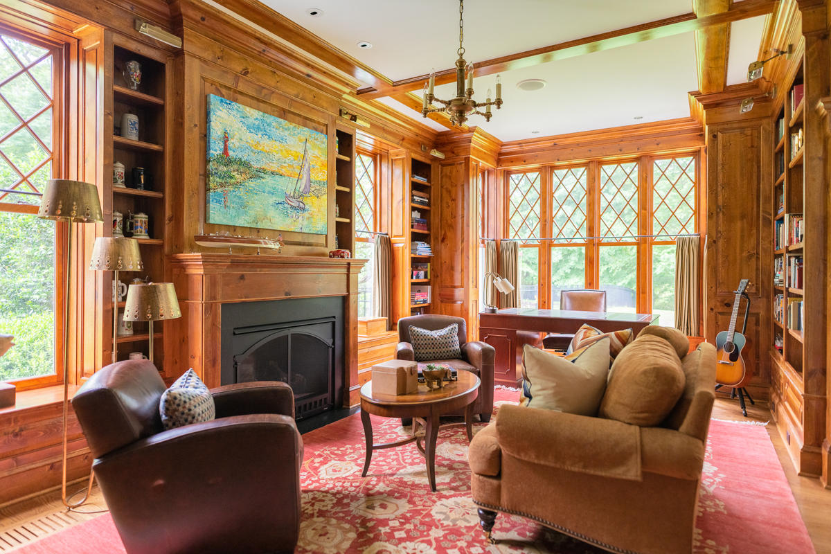 8 Shady Acres Road Darien, CT 06820 - Photo 7 of 18 a living room with furniture a fireplace and next to a window