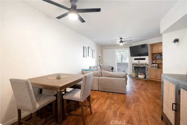 a view of a livingroom with furniture and a flat screen tv