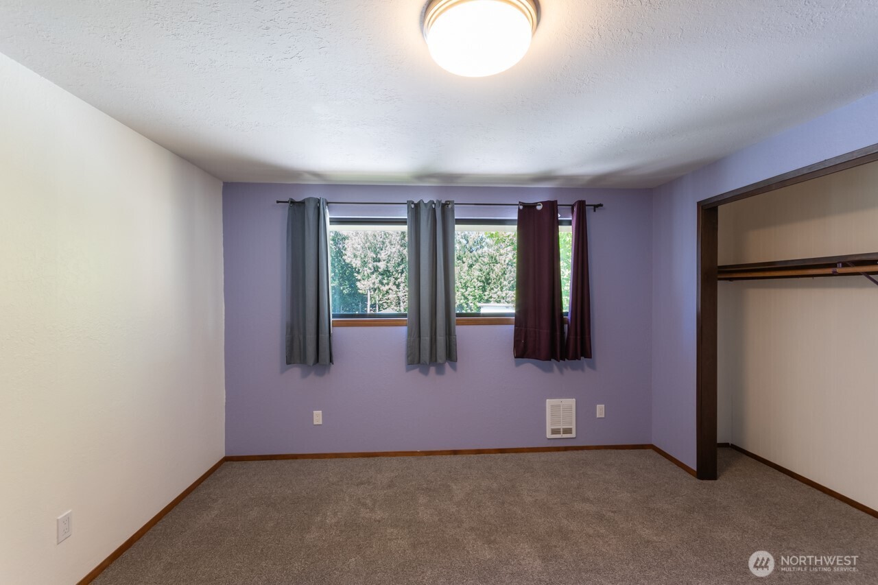 63 East Arnette Road Port Angeles, WA 98362 - Photo 29 of 40 an empty room with windows