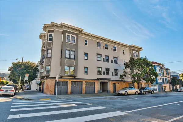 a view of a building with a street