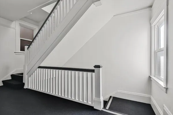 a view of hallway with stairs