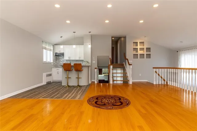 a living room with furniture and a table