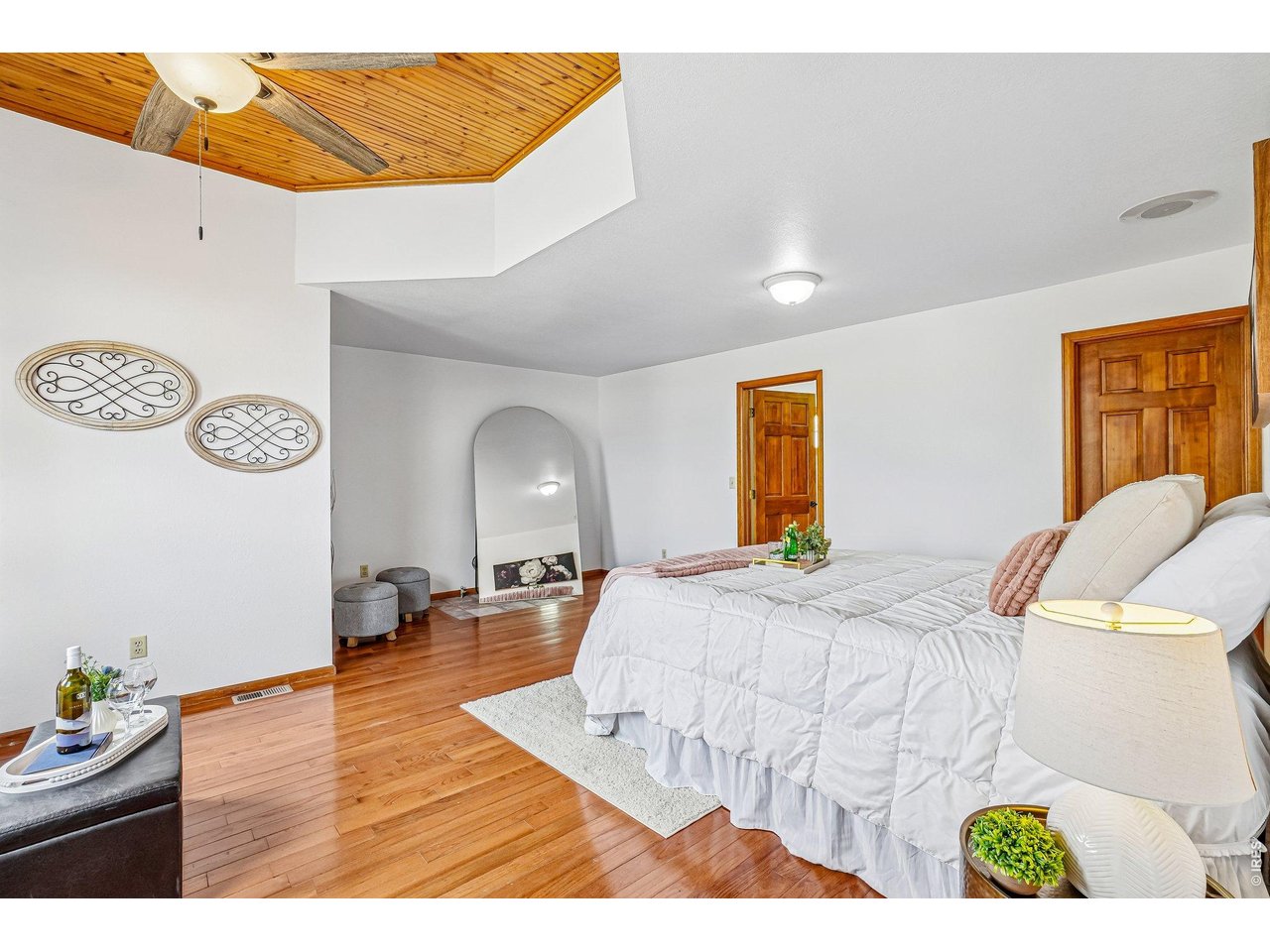9743 Yellowstone Road Longmont, CO 80504 - Photo 23 of 50 The primary bedroom has so much character and stunning views