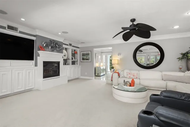 a kitchen with stainless steel appliances granite countertop a sink a stove and cabinets