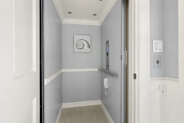 a spacious bathroom with a granite countertop sink mirror and a bathtub