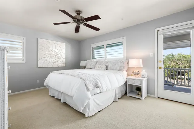a bathroom with a toilet a sink and a mirror