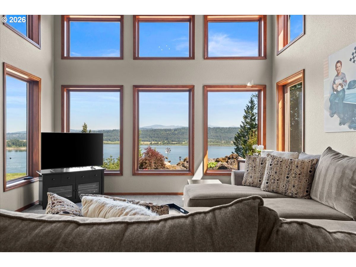 37123 Northeast Reed Road Corbett, OR 97019 - Photo 13 of 48 a living room with furniture and a flat screen tv