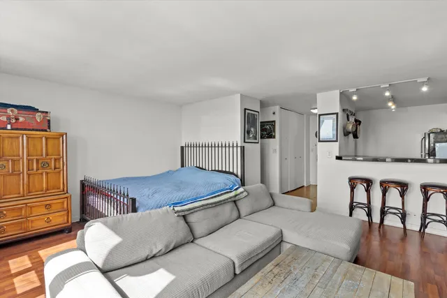 a living room with furniture and a table