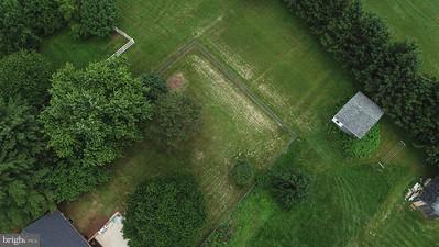 1639 Old Manchester Road Westminster, MD 21157 - Photo 4 of 24 Fenced rear yard and propety goes to the trees