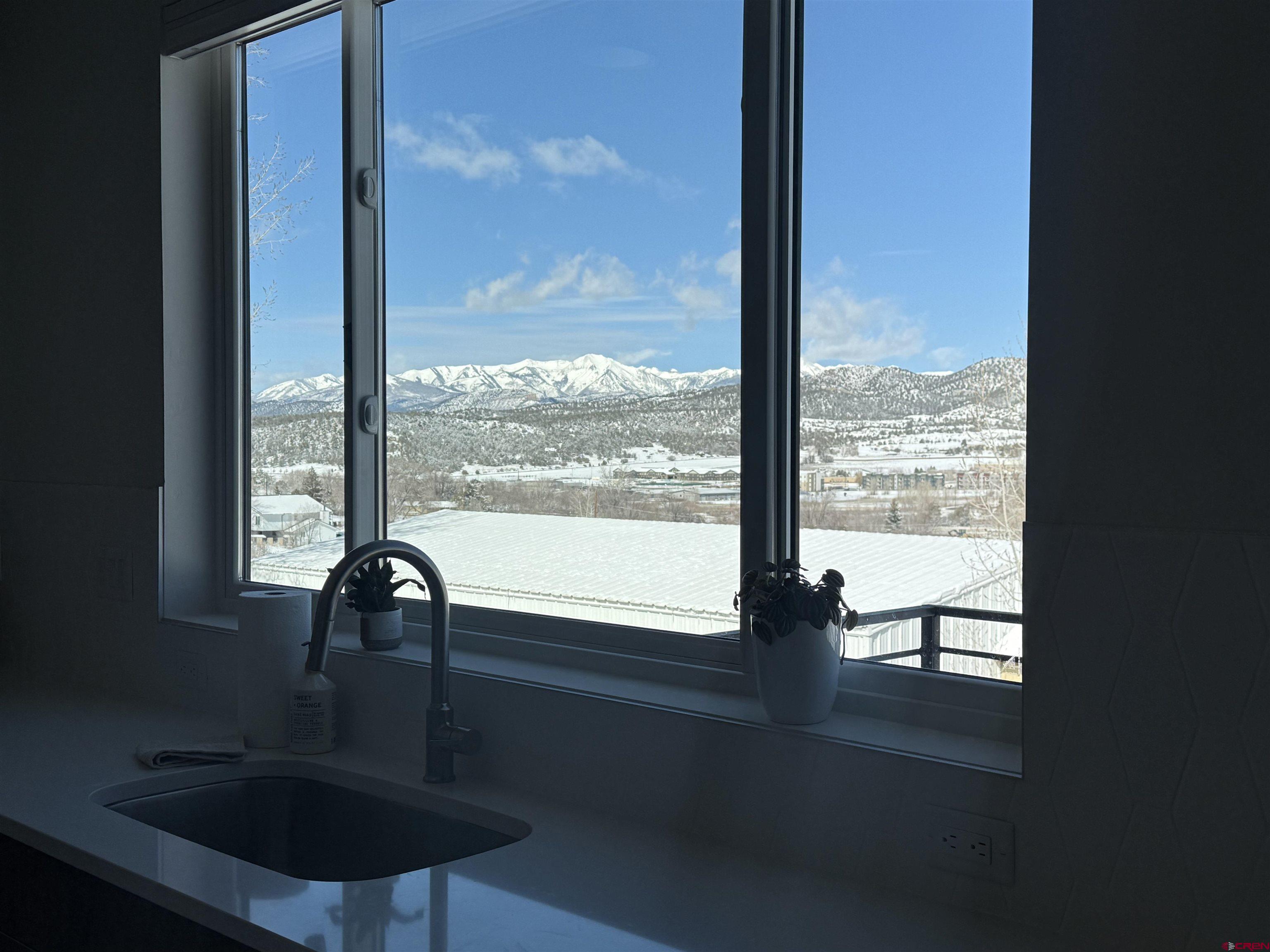 205 Treeline Street Durango, CO 81303 - Photo 22 of 39 a dining room with a window