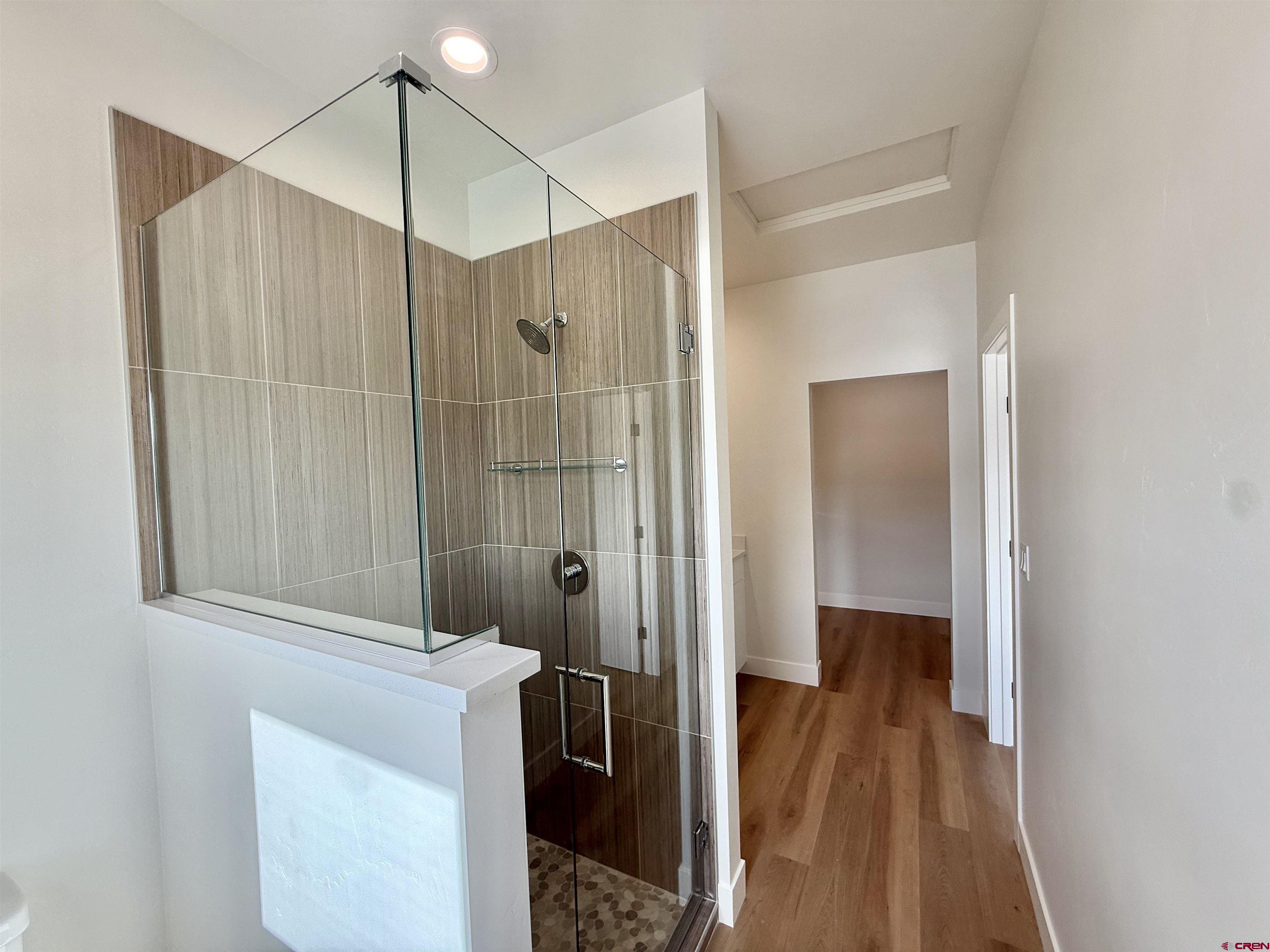 205 Treeline Street Durango, CO 81303 - Photo 32 of 39 a bathroom with a shower and a sink