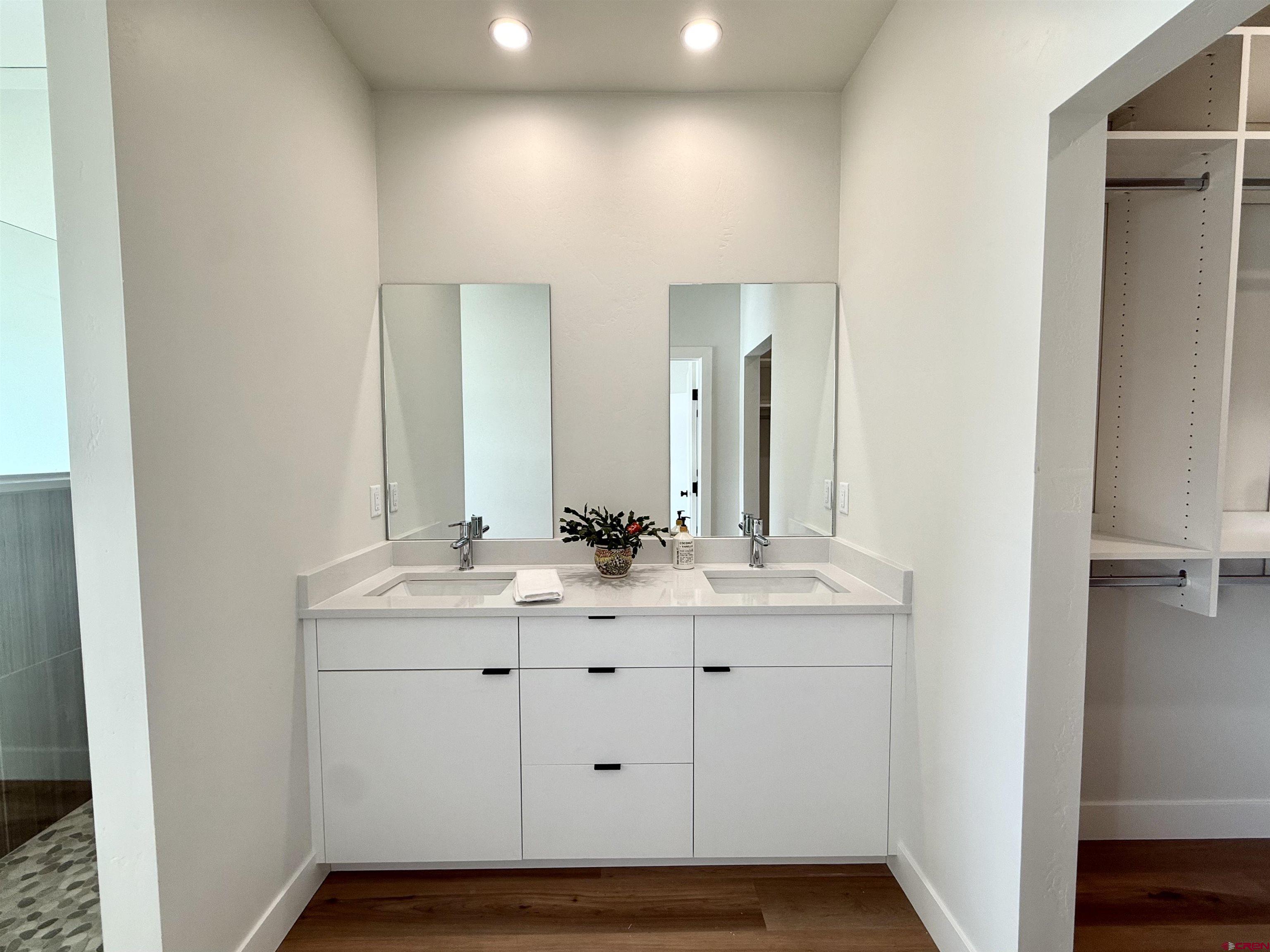 205 Treeline Street Durango, CO 81303 - Photo 34 of 39 a bathroom with a sink and a mirror