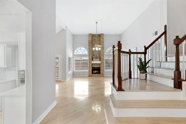 a view of a hallway view with staircase