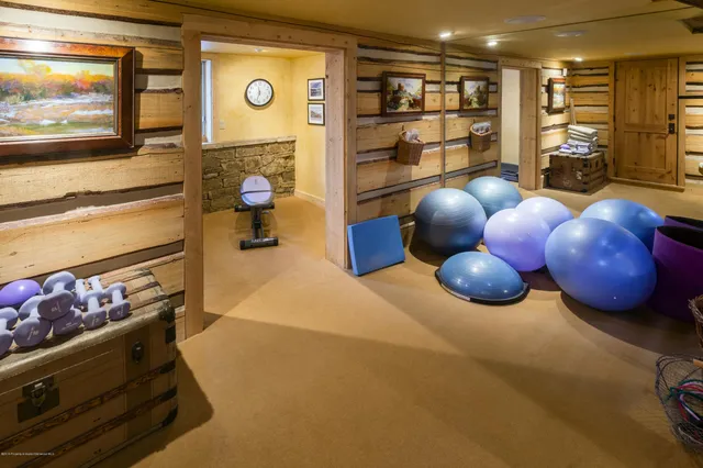 a room with a table and chairs